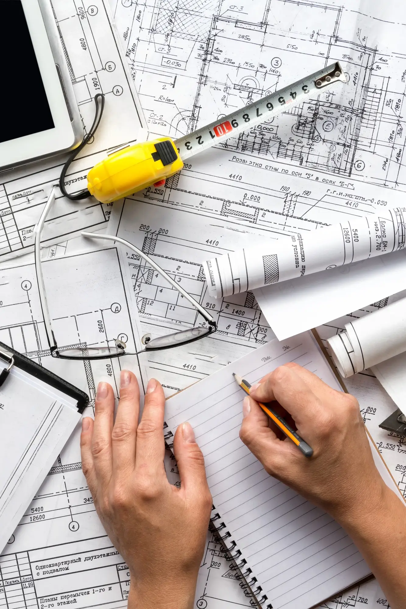architect-design-working-drawing-sketch-plans-blueprints-and-making-architectural-construction-model