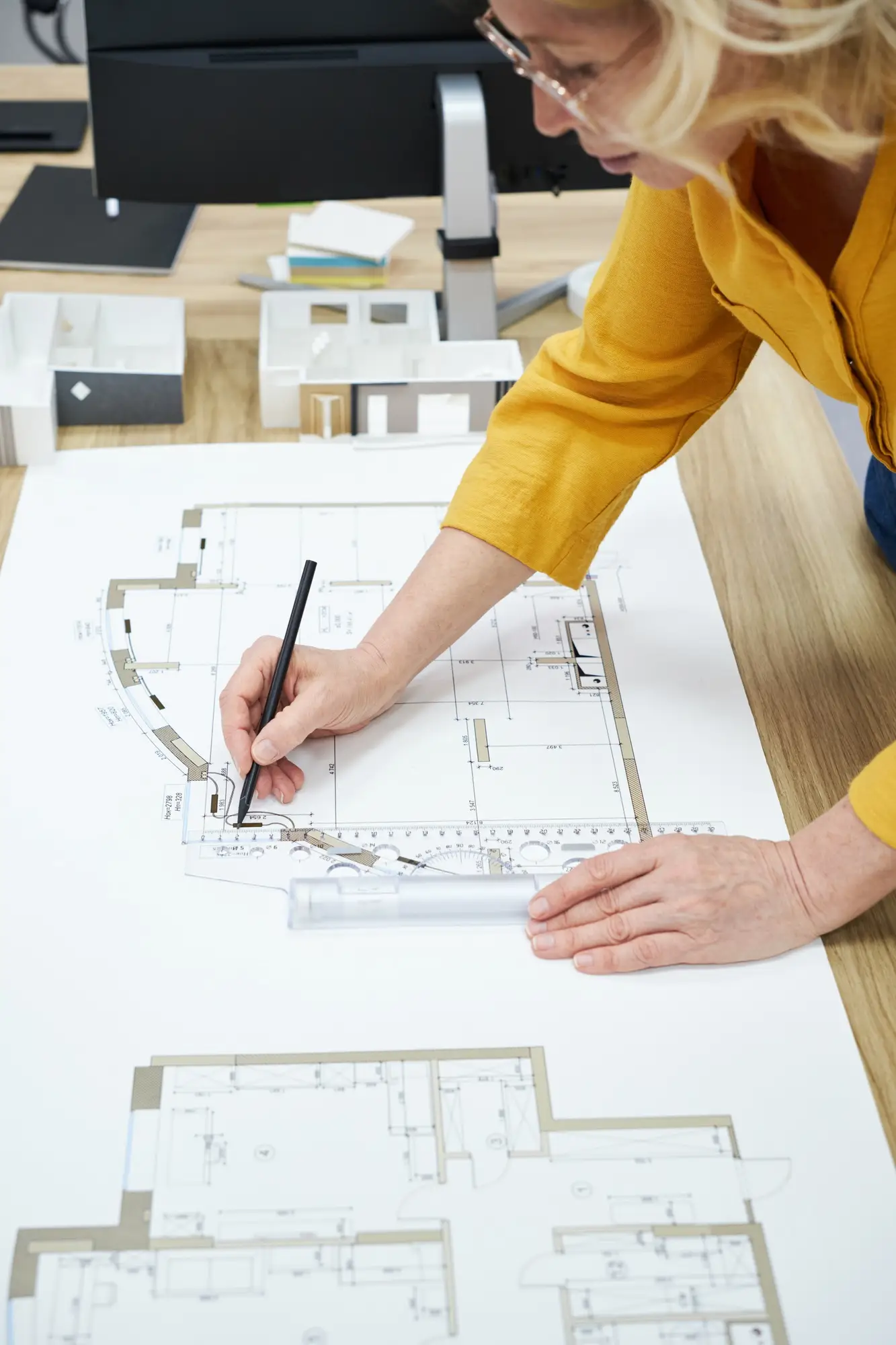 architect-drawing-on-architectural-project
