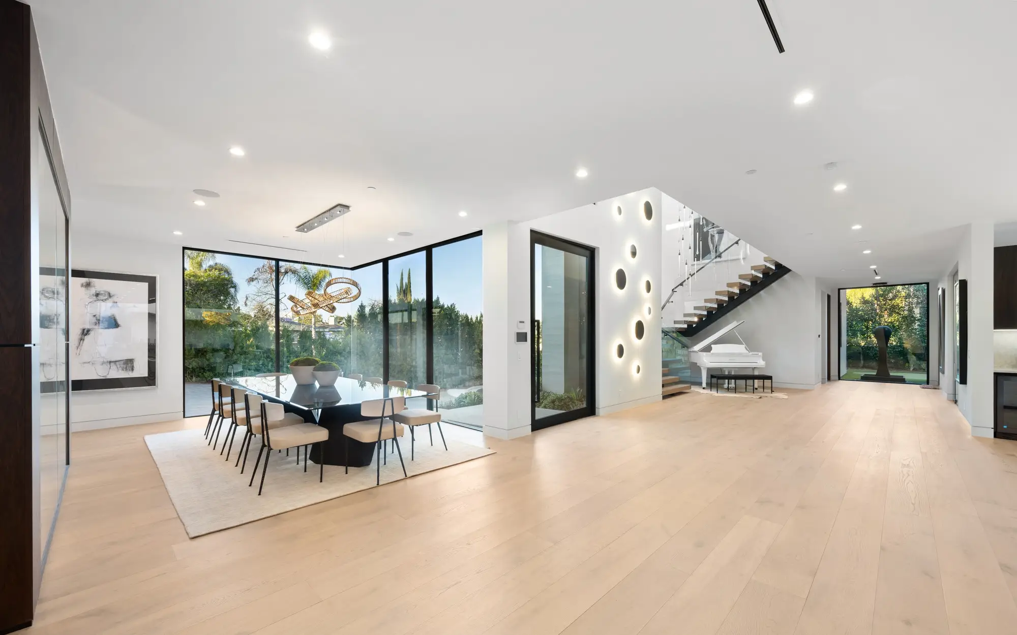 spacious-dining-room-in-a-modern-house-in-a-white-color-scheme